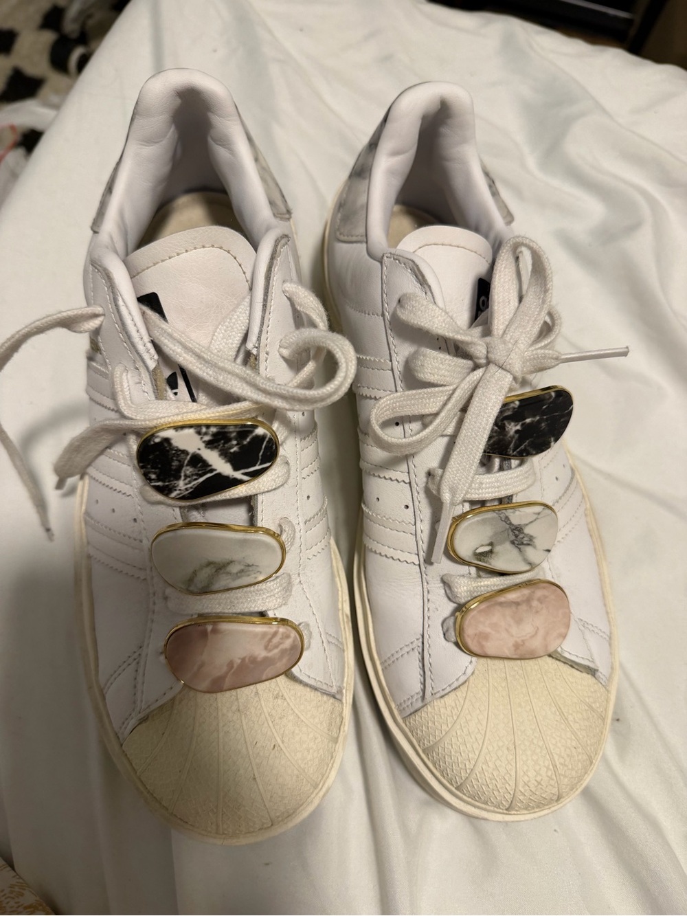 Women's White Leather Casual Sneakers with Marble Accent Charms